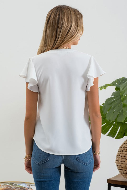 TOP White . SOLID FLUTTER SLEEVE WOVEN TOP White