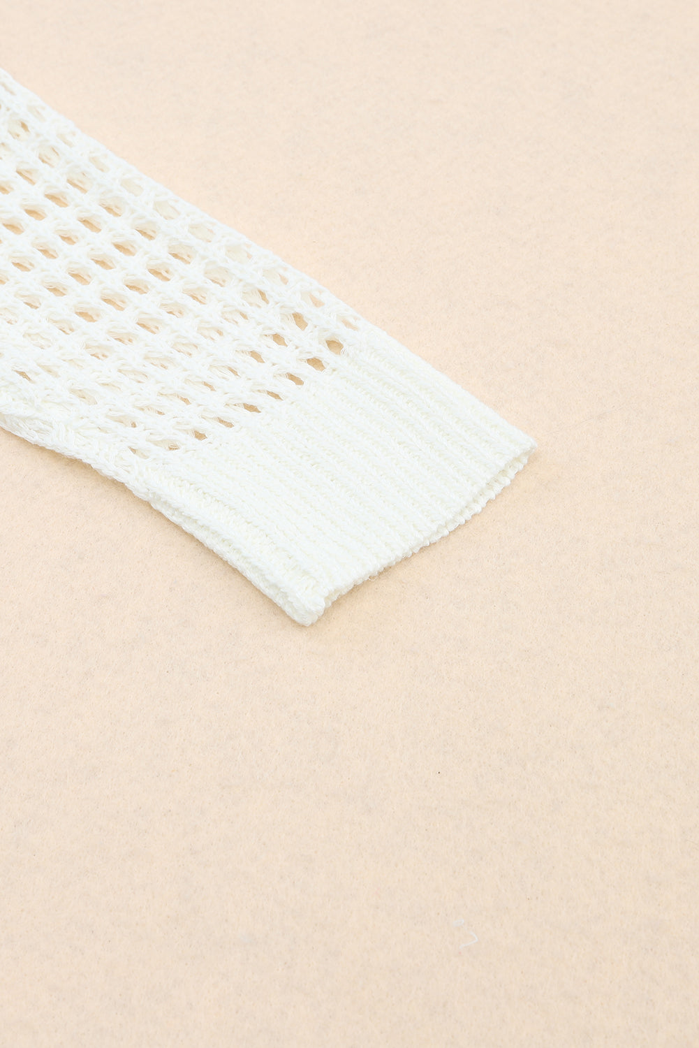 Top .. Black Color Block Eyelet Long Sleeve Twisted Back Knit Top