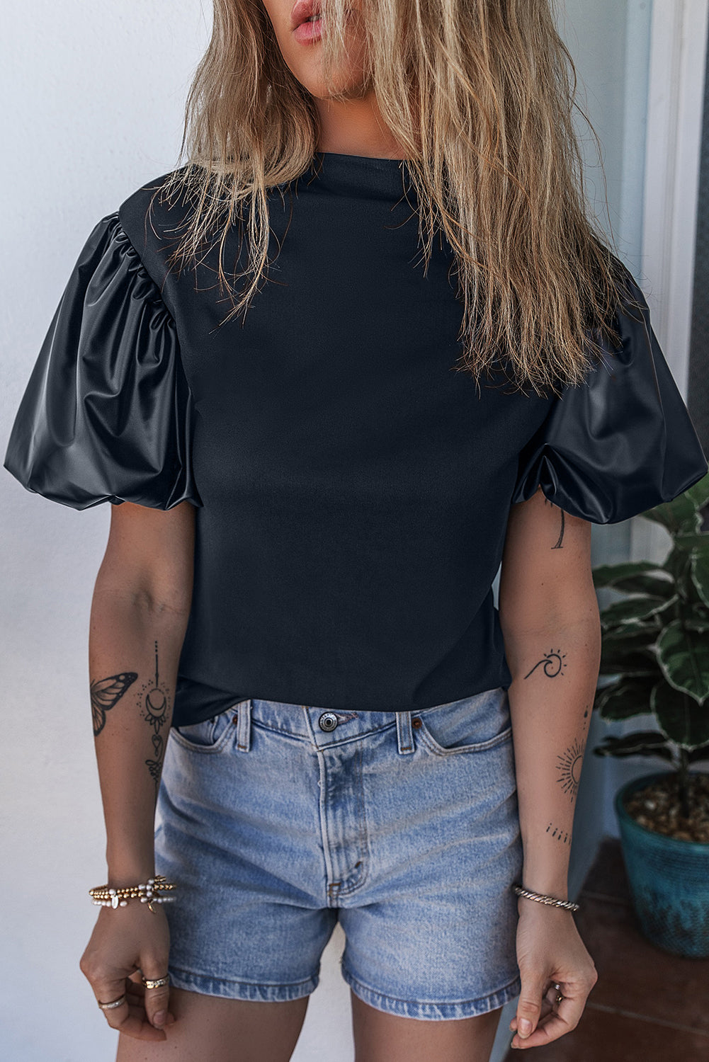 Top  .  Black Faux Leather Puff Short Sleeve Mock Neck Top