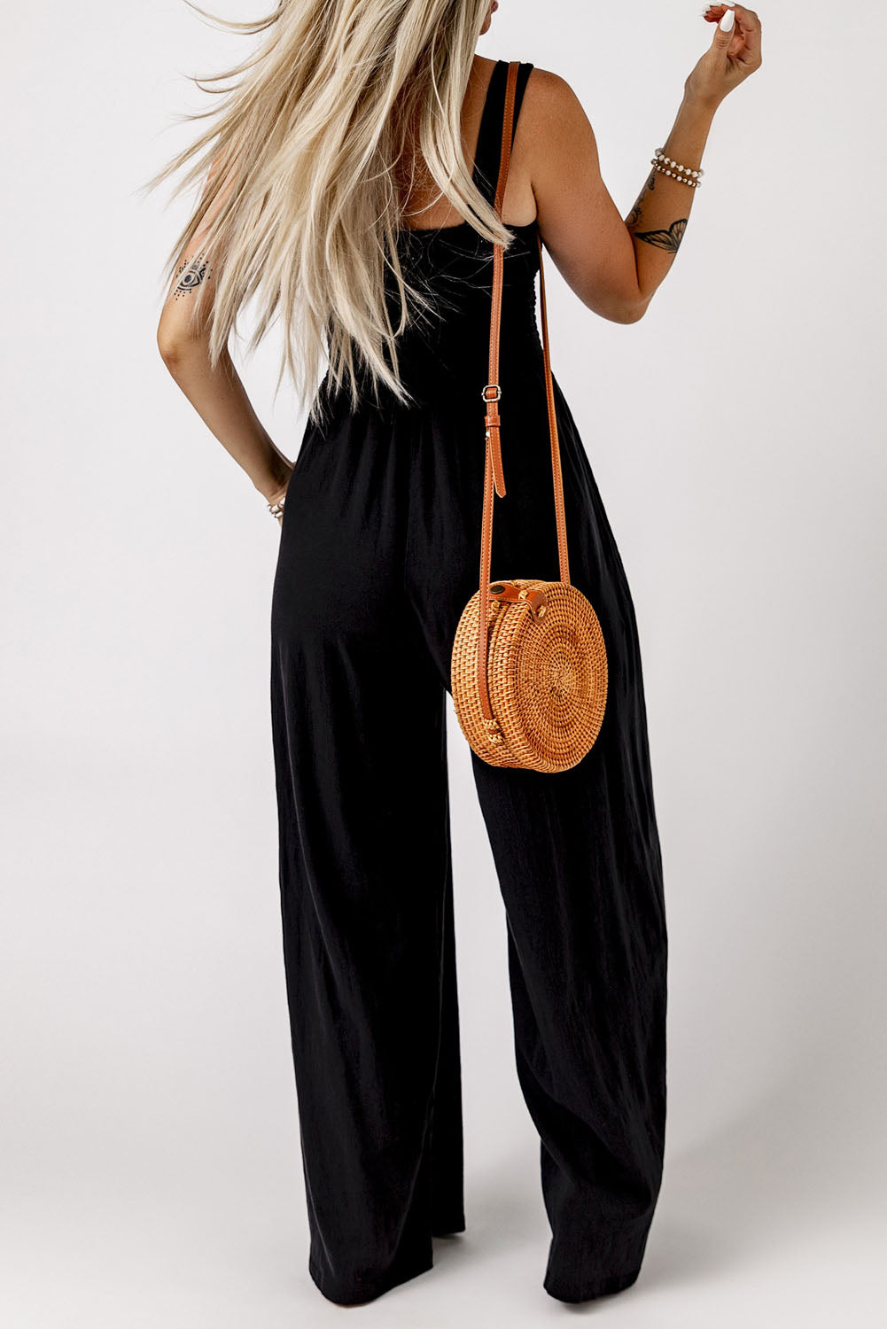 Jumpsuit with Pockets  .  Black Smocked Sleeveless Wide Leg