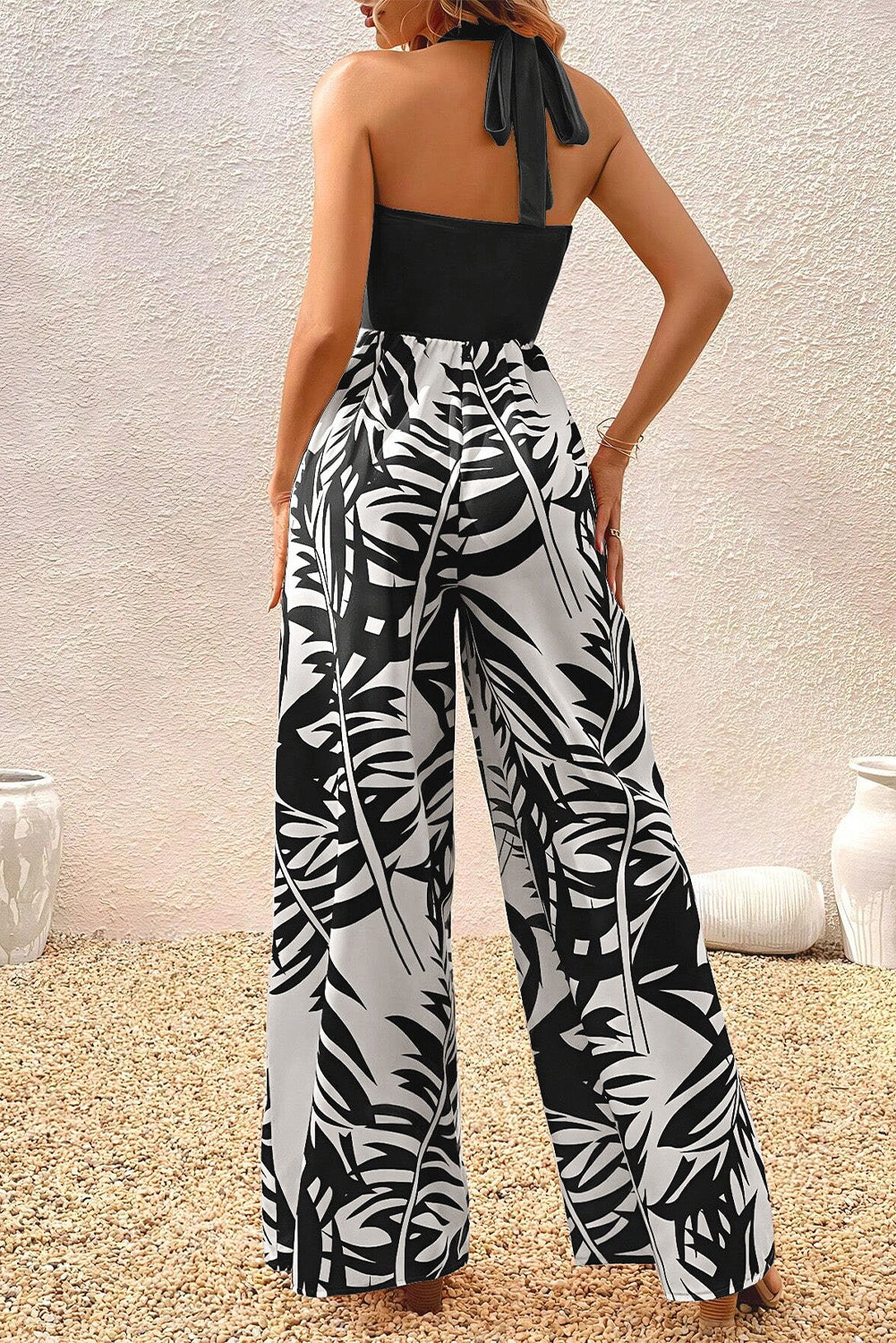 Jumpsuit  .  Black Halter Tropical Plant Print Wide Leg Jumpsuit