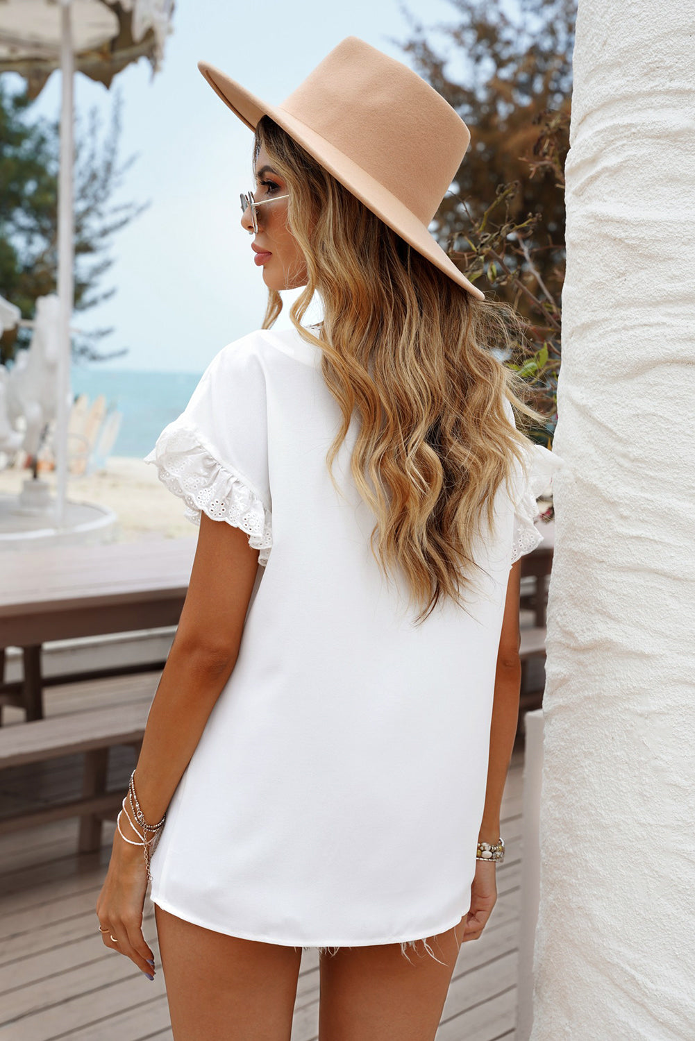 T-shirt  .  White V Neck Ruffle Short Sleeve T-shirt