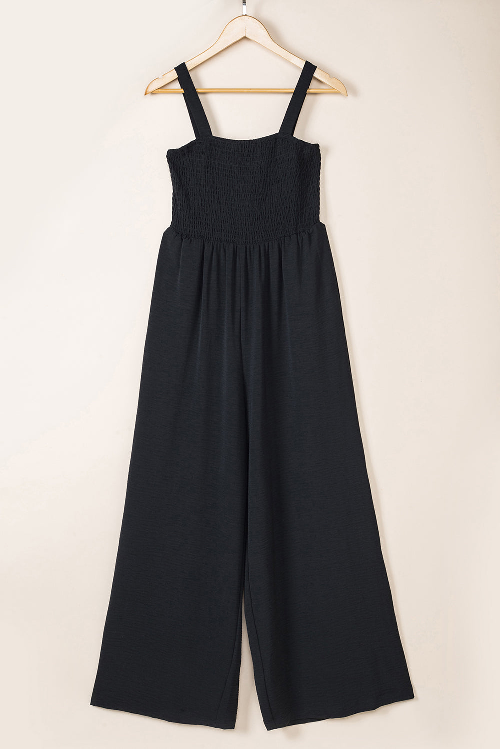 Jumpsuit with Pockets  .  Black Smocked Sleeveless Wide Leg