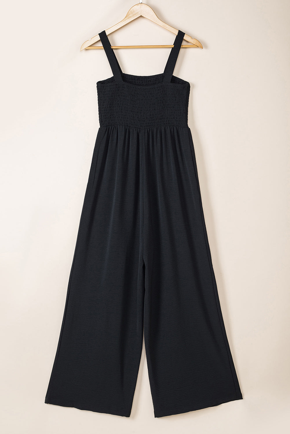 Jumpsuit with Pockets  .  Black Smocked Sleeveless Wide Leg